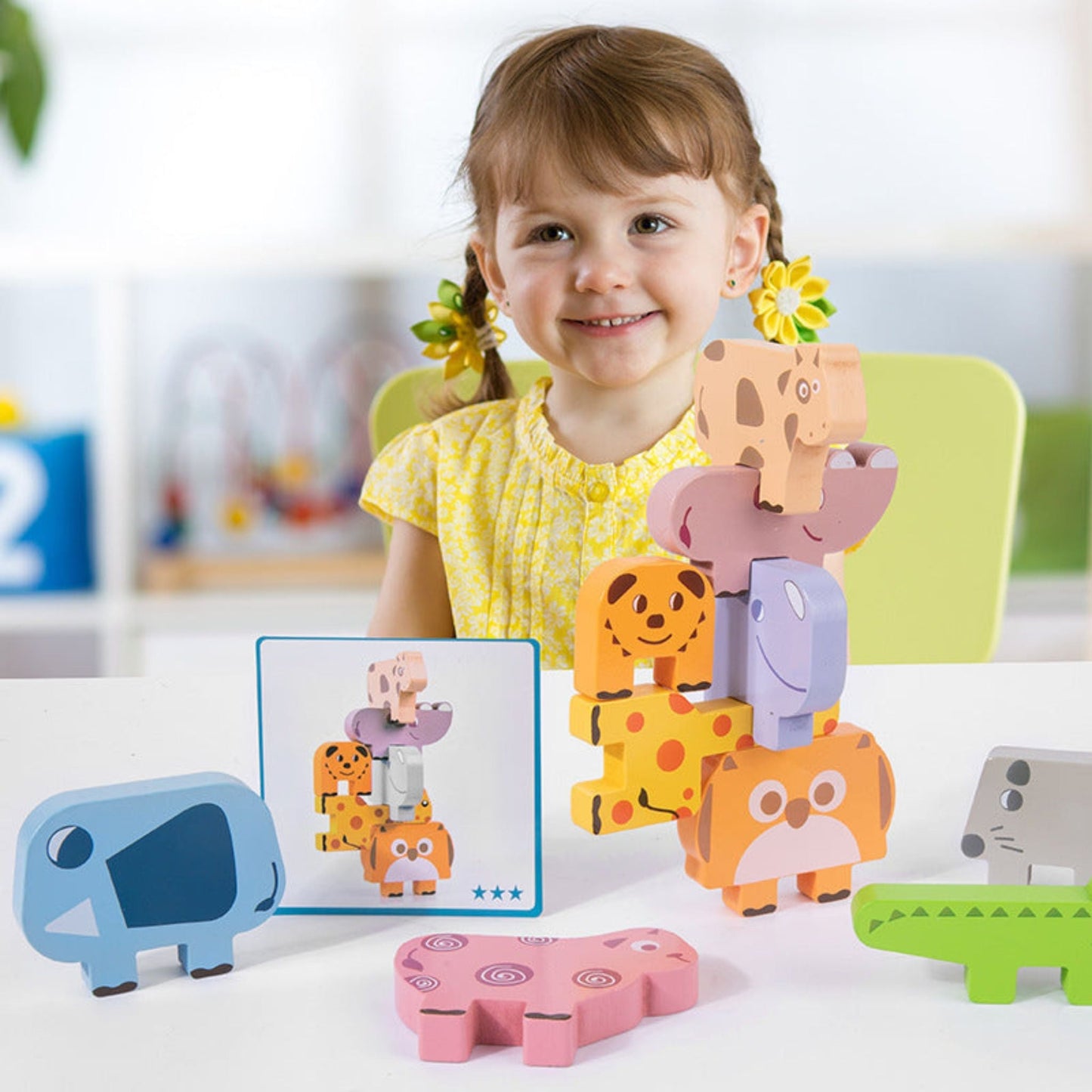 Stapelhölzer mit Montessori-Tieren
